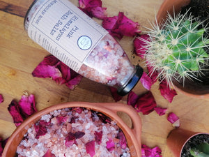 Pink Himalyan Bath Salt in bottle with rose petals