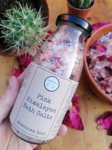 Pink Himalyan Bath Salt in bottle with rose petals